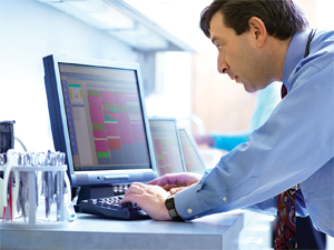 Dr. Andrew Baumel accesses patient records electronically.